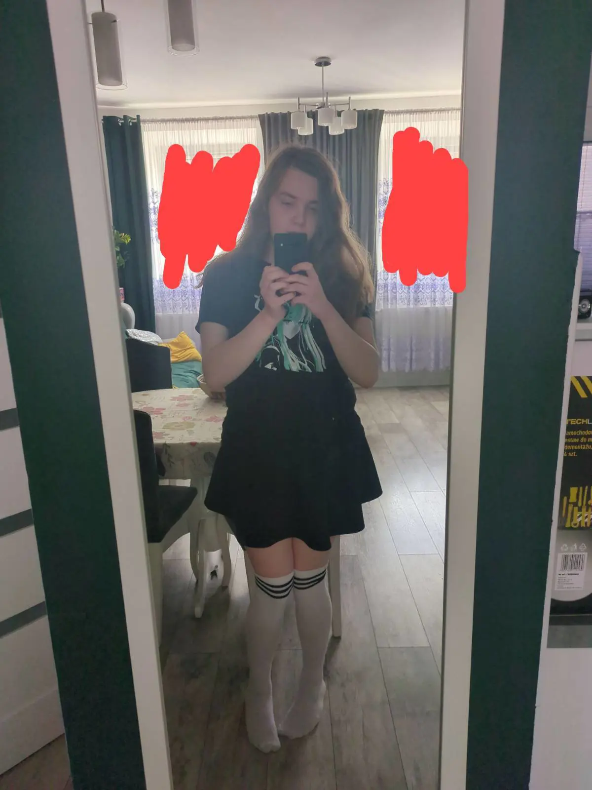 Photo of me, I'm wearing Hatsune Miku shirt, black skirt, and white thigh highs with 3 black strips at the top.
